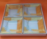 Quatro petisqueiras em vidros na cor amarelo medindo 9x9cm
