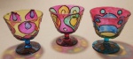 Trio de tacinhas em vidro para luminárias na técnica vitral medindo 7x7 cm.Acompanha vela..