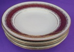 Cinco pratos fundos em porcelana Rio Branco Guanabara com filetes dourados, frisos e barrado vermelho meidndo 23 cm.