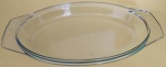 Travessa oval Colorex SM transparente medindo 35x21 cm.