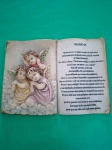 Pagina aberta de livro de resina com anjos e escrita com Salmo 91  medindo 21x15 cm.