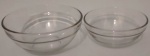 Dois potinhos em vidro transparente medindo 9x5,11x5x4 cm.