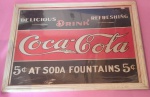 Quadro Coca-cola moldura branca medindo 32x43 cm.
