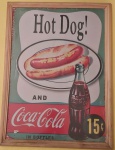 Quadro Coca-cola Hot dog medindo 32x43 cm.