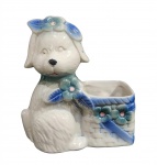 ANTIGO BIBELÔ EM PORCELANA DA DÉCADA DE 60 RETRATANDO UM CACHORRO. NUMERADO NA BASE. MEDINDO 17 X 9 X 15.5 CM