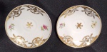 PORCELANA SÃO JOÃO ( RECIFE ) - PAR DE PIRES DE CAFÉ EM PORCELANA ORNADA A OURO. MEDINDO  O PIRES 10.5 CM
