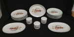 CONJUNTO PARA CHURRASCO EM PORCELANA DECORQADOS COM  TEMA DE CHURRASCO. MARCAS DE USO E  DOI PRATOS RASIOS E DUAS TRAVESSAS COM BICADO. MARCA NO FUNDIO. 12 PRATOS RASOS; 3 POTES MOLHO E FARINHA; E 3 TRAVESAS NO TOTAL