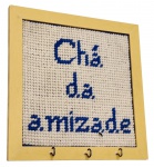 Suporte de parede em madeira e lã - 25x25 cm.