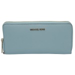 MICHAEL KORS  Carteira de couro padrão Jet Set Travel azul com detalhes dourados. Com alça de pulso. 11 x 22 cm. Peça nova, sem uso.