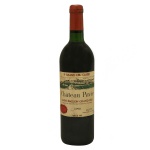 Vinho tinto francês Château Pavie, safra de 1990, de prestígio classificado como 1er Grand Cru Classé de Saint-Émilion, com denominação de origem controlada. Vinho de mesa tinto seco.