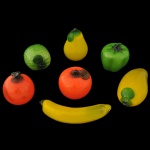 Coleção de  7 frutas em vidro artístico de Murando, constando: banana (19 cm), laranja (8 x 8 cm), manga (8 x 14 cm), pera (11 x 8 cm) e limão (11 x 8 cm) e maçã.