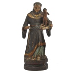 Imagem de Santo Antônio de Pádua segurando Menino Jesus em madeira policromada. 20 x 9 x 5 cm.