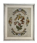 TAPEÇARIA, uma (1) tapeçaria floral, emoldurada em madeira com patina branca e filete dourado, medindo 57,5x48cm, sinais de cupim na moldura.