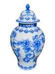 PORCELANA, um (1) potiche confeccionada em porcelana na tonalidade branca, decorado por elementos florais, geométricos e pássaros na tonalidade azul, medindo 26x7cm.