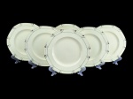 ALFRED MEAKIN, MARIGOLD, linha PRINCESS SHAPE, seis (6) pratos para pão confeccionados em faiança vitrificada na tonalidade branca com formato dodecágonal, decorado por filetes geométricos em prata, medindo 18cm de diâmetro, 2 com sinais de craquele.