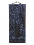 ZECA, uma (1) talha em madeira escura representando Santo Antônio, datada de 1973, corrente em ferro com oxidação, medindo 70x30,5cm.