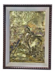 QUADRO, uma (1) placa em metal dourado trabalhada em relevo, representando figura feminina ajoelhada em oração, com auréola, inserida em paisagem. Emoldurado em madeira, com passe-partout branco e moldura externa entalhada em tom escuro, medindo 63,5x48cm.