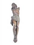 ARTE SACRA, um (1) imaginário representando Jesus Crucificado confeccionado em madeira entalhada a mão com patina envelhecida, apresenta quebra nas mãos e no pé, medindo 23cm de altura.