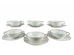 Edelstein (Bavaria), seis (6) xícaras consumer com seus respectivos pires, confeccionados em porcelana alemã na tonalidade branca com borda e alça filetada em ouro, medindo 5x16x12cm. 1 bicada na borda.