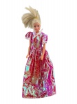 COLECIONISMO, uma (1) boneca Mattel confeccionado em material plástico, vestes em tecido sintético na tonalidade rosa citilante, pequenos desgastes nas vestes, medindo 29cm de altura.