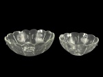 LUSTRES, duas (2) bacias para montagem ou reposição de lustres confeccionados em cristal translucido com lapidação de frisos e formas geométricas em baixo relevo, alguns com discretos bicados, medindo 9x22cm e menor 8x17,5cm (rachadura no fundo).