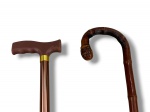 DIVERSOS, lote com duas (2) bengalas confeccionados em madeira, sendo 1 com castão curvo com corpo no feitio de bambu e 1 ajustável com corpo em metal cobreado e castão em material plástico, medindo 90cm e 94cm.