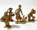 Quatro figuras representando camponeses confeccionadas em baquelite. Medidas:  Maior 15 cm / Menor 10 cm