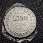 Brasil, moeda de prata de 1000 réis de 1907, com peso total de 10 gramas (prata 0,900). Inicial abaixo da cotação do metal