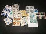 Lote com 12 quadras de selos comemorativos, diferentes, tema Esportes. Total de 48 selos