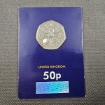 Inglaterra, moeda em folder especial de 50 pence, flor de cunho