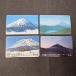 Japão, lote com 4 cartões de telefone "MONTES"