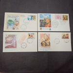 Lote com 4 FDC's de viagens do Papa João Paulo II