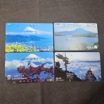 Japão, lote com 4 cartões de telefone "MONTES"