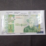 Brasil, cédula fantasia em folder especial, "Santos Dumont" de 1 real. Flor de estampa