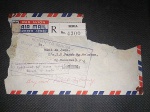 Brunei, envelope circulado com registro de `SERIA` EM 1956 PARA LIMBANG-SARAWAK, com carimbo violeta de `retorno para o remetente` por insuficiência de franquia e outro carimbo `UNDELIVERED FOR REASON STATED RETURN TO SENDER`. Danificado no CSD