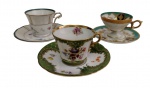 Conjunto de três xícaras de coleção para café em porcelana esmaltada, de diferentes manufaturas, com decoração policromada, frisos dourados e acabamento filetado a ouro, acompanhadas de seus respectivos pires. Sendo uma Limoges.