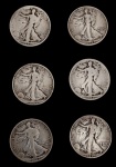 Estados Unidos. Lote composto por 6 moedas Half Dollar Walking Liberty, em prata, cunhadas entre 1935 e 1945, apresentando no anverso a alegoria da Liberdade em marcha (Walking Liberty) e, no reverso, a águia americana pousada sobre rochedo. Peso total: 73,0 g.