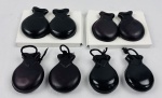 Quatro pares de castanholas espanholas, acondicionados em caixa original, confeccionados em madeira, próprios para música e dança tradicional espanhola.