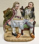 Belo grupo escultório  em porcelana representando  cavaleiros jogando xadrez. Marca: xx  Mede: 17 x 14 cm.