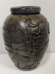 Antigo vaso em madeira ricamente talhada  com temas florais . Mede: 26 cm