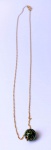 Cordão em OURO  18 K com pingente de bolinha ornamentada. Pesa: 1,64 . Mede: 38 cm aberta.