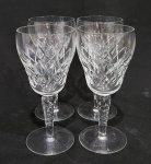 QUATRO  TAÇAS EM CRISTAL. 1 COM TRINCADO. MEDINDO 17 X .7.5 CM