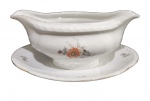 ANTIGA MOLHEIRA EM PORCELANA TCHECA MZ COM DECORAÇÃO FLORAL. MEDINDO 10 X 13 X 20 CM
