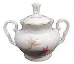ANTIGO AÇUCAREIRO EM PORCELANA MAUÁ COM DECORAÇÃO FLORAL. MEDINDO 13 X 10 X 15 CM