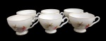 CONJUNTO DE SEIS XÍCARAS CHÁ EM PORCELANA MAUÁ COM DECORAÇÃO FLORAL. SEM OS PIRES.   MEDINDO 6 X 9 X 11 CM