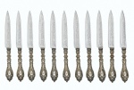 Conjunto de 11 facas de sobremesa com cabo em prata de lei de origem europeia. Med. 16 cm