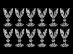 BACCARAT HARCOURT: Conjunto de 12 taças de vinho do porto em cristal francês da manufatura de Baccarat lapidado em modelo Harcourt , cada peça apresenta marca da manufatura gravada a jato de areia. Med. 9 cm