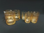 5 copinhos (6 cm d x 8 cm alt) e 3 copos para whisky (7,5 cm d x 8,5 cm alt) (1 com pequeno pic na borda) em cristal na cor fumê marca Hering.
