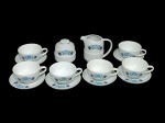 Conjunto em  porcelana nacional marca Steatita,, com: 6 xícaras e seus respectivos pires para chá, jarrinha e açucareiro,