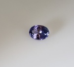 Tanzanita Azul/Roxo 1,3 ct 100% Natural. Peso total: 1,3 ct. Dimensão: 7,99 x 6,03 x 3,86 mm. Cor: Azul/Roxo . Lapidação: Oval facetada  . Tratamento: 100% Natural . Código: F-1552